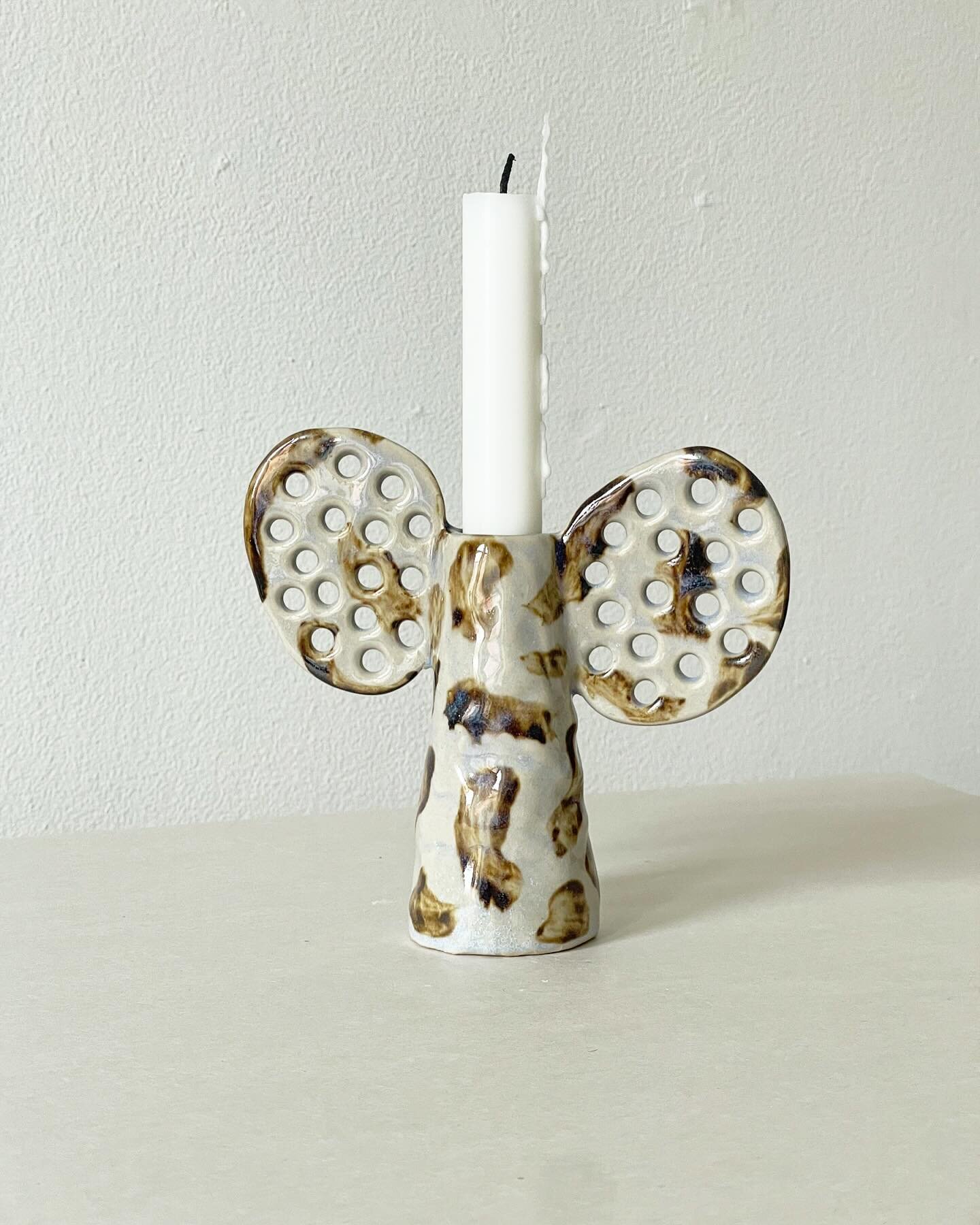 Candleholder handmade in a bone white stoneware dipped in a light blue crystal glaze and decorated with brushstrokes made with a brown slip 🤎💎