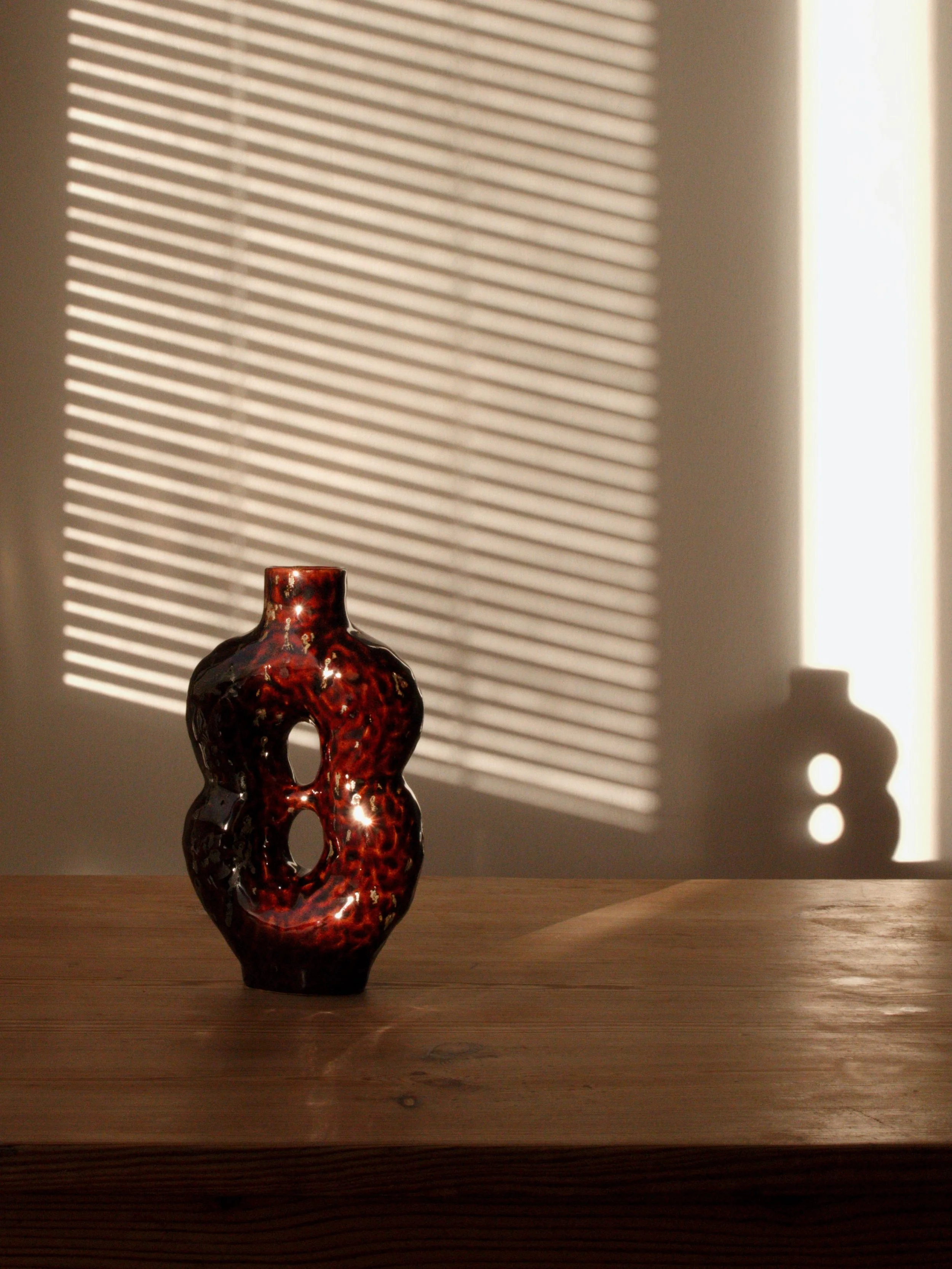 Handmade vas glazed in a delicious tenmoku glaze 🌰
