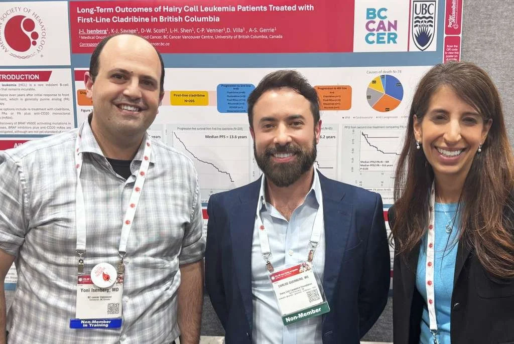 Yoni Isenberg, MD (BC Cancer), Carlos Guerrero (HCLF), and Alina Gerrie, MD (BC Cancer) stand in front of a BC Cancer poster on HCL at the 67th Annual ASH Conference 2025.