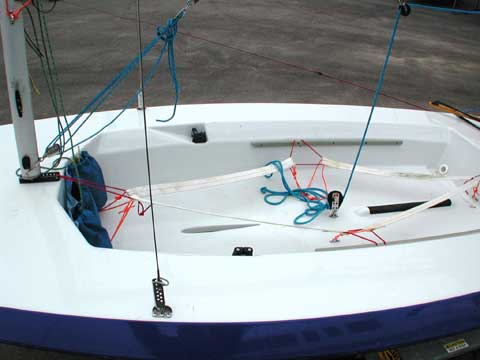 The cockpit area doesn't hold much. We suggest to bring only a couple bottles of water and some snacks in a small dry bag. (All your “stuff” needs to fit in those little blue pockets up front, or it can fall out / get lost / wet!)