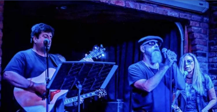 A photo of the Little Plains Band performing on the Finley’s stage.