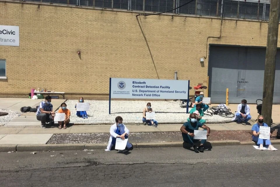 Vigil draws attention to class action suit on behalf of detained immigrants