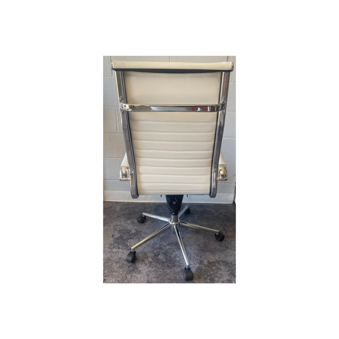 White ribbed mid-back office chair with contemporary styling at a Morrisville, NC furniture showroom.