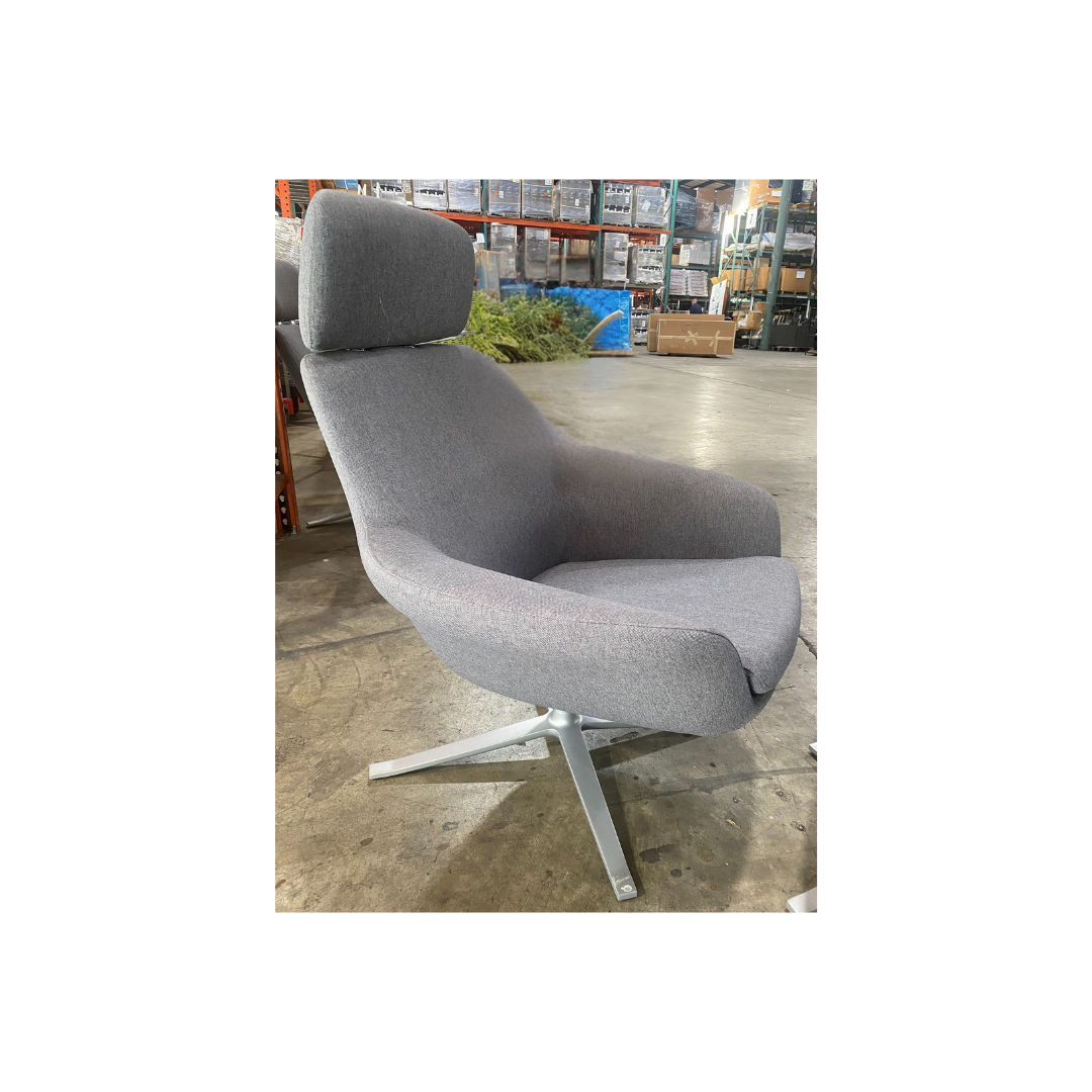 Modern gray fabric lounge chair with ottoman featuring sleek cross base legs and ergonomic design