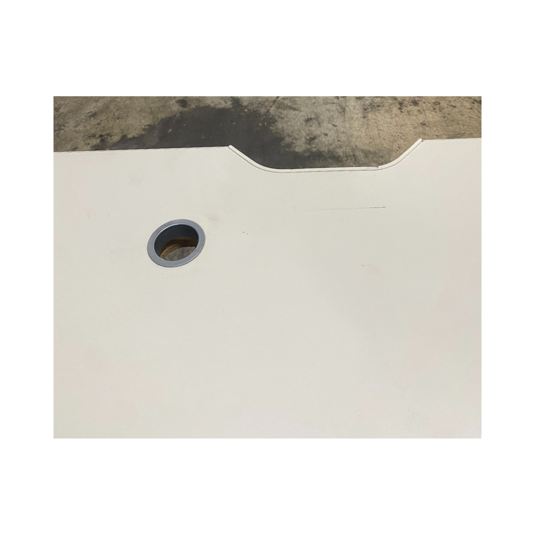 Worktable with a white top, front notch detail, and silver metal pedestal base