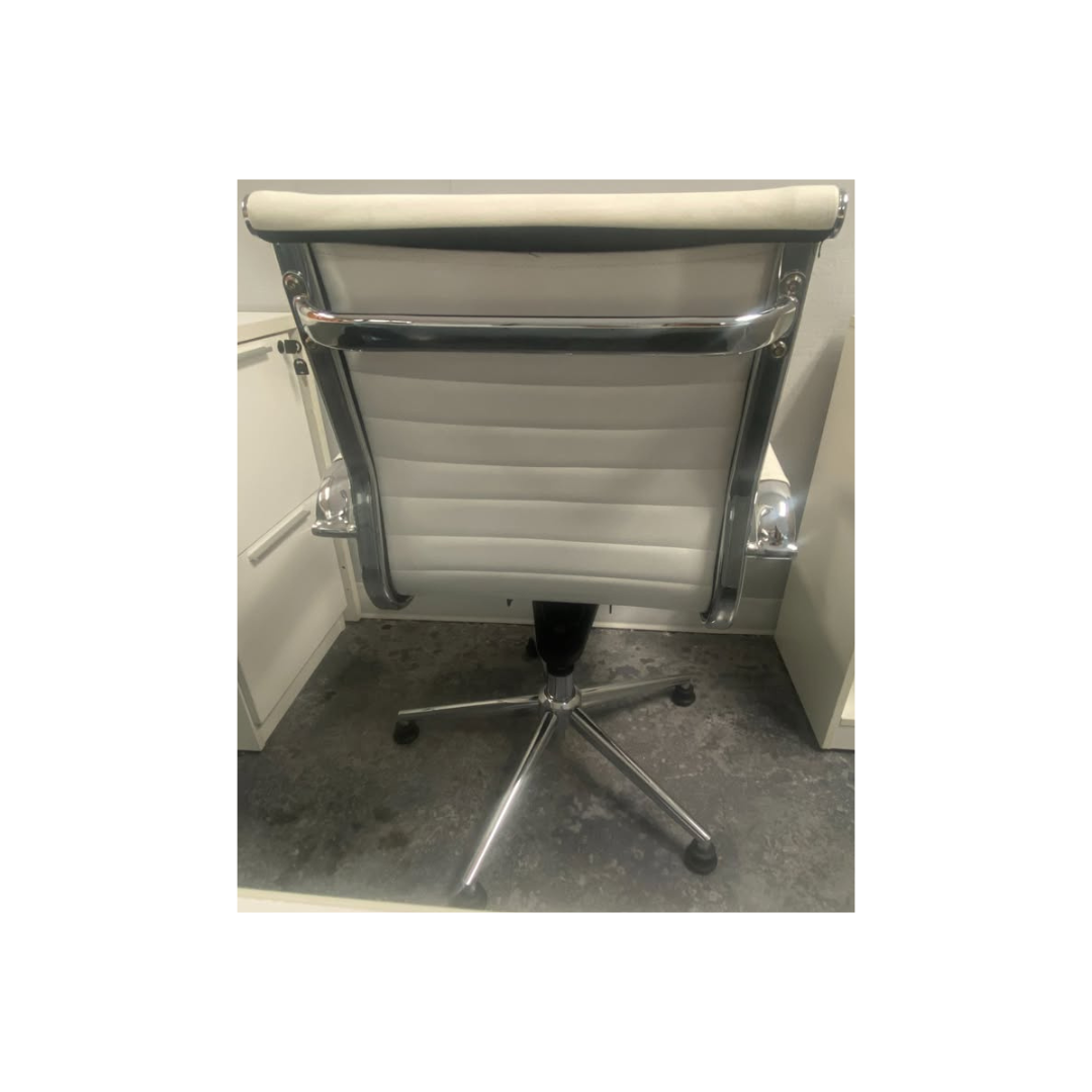 White ribbed high-back executive office chair with armrests, available in Morrisville, NC.