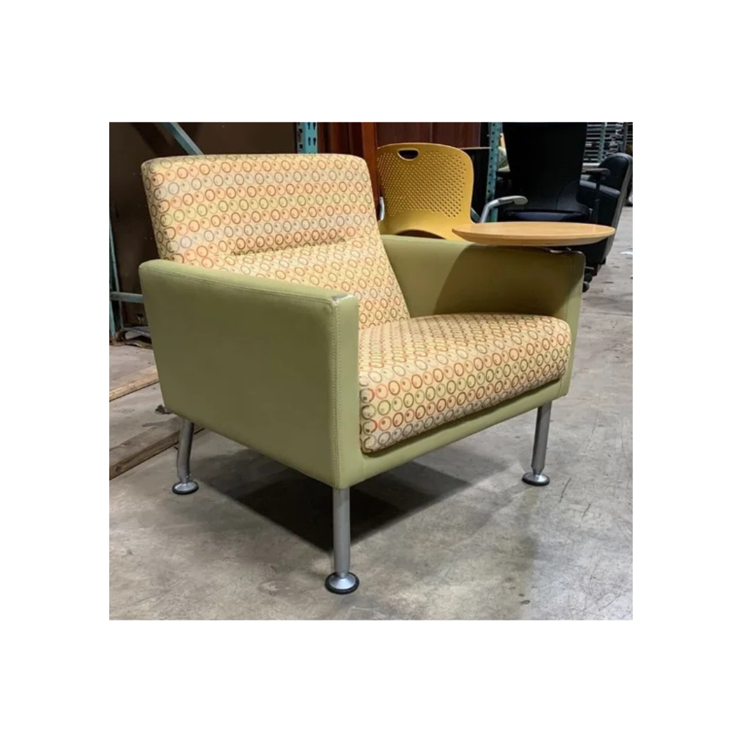 Contemporary armchair with clean lines, low profile, ideal for office or lobby seating