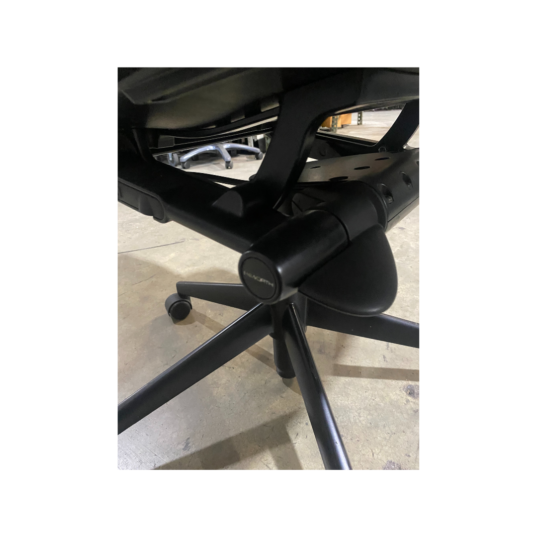 Haworth X99 task chair pre-owned model with breathable mesh back and durable base, available locally at Dynamic Office Services