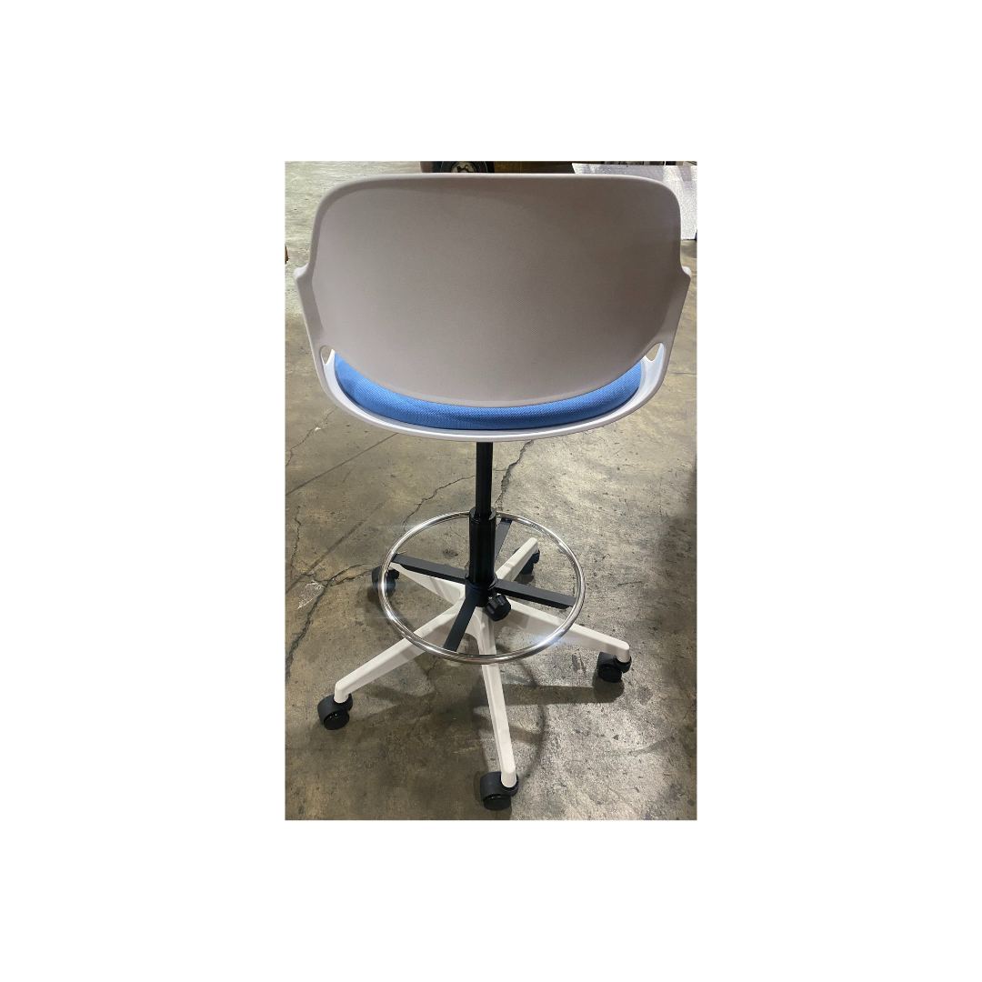 Adjustable task stool with ergonomic shell back.