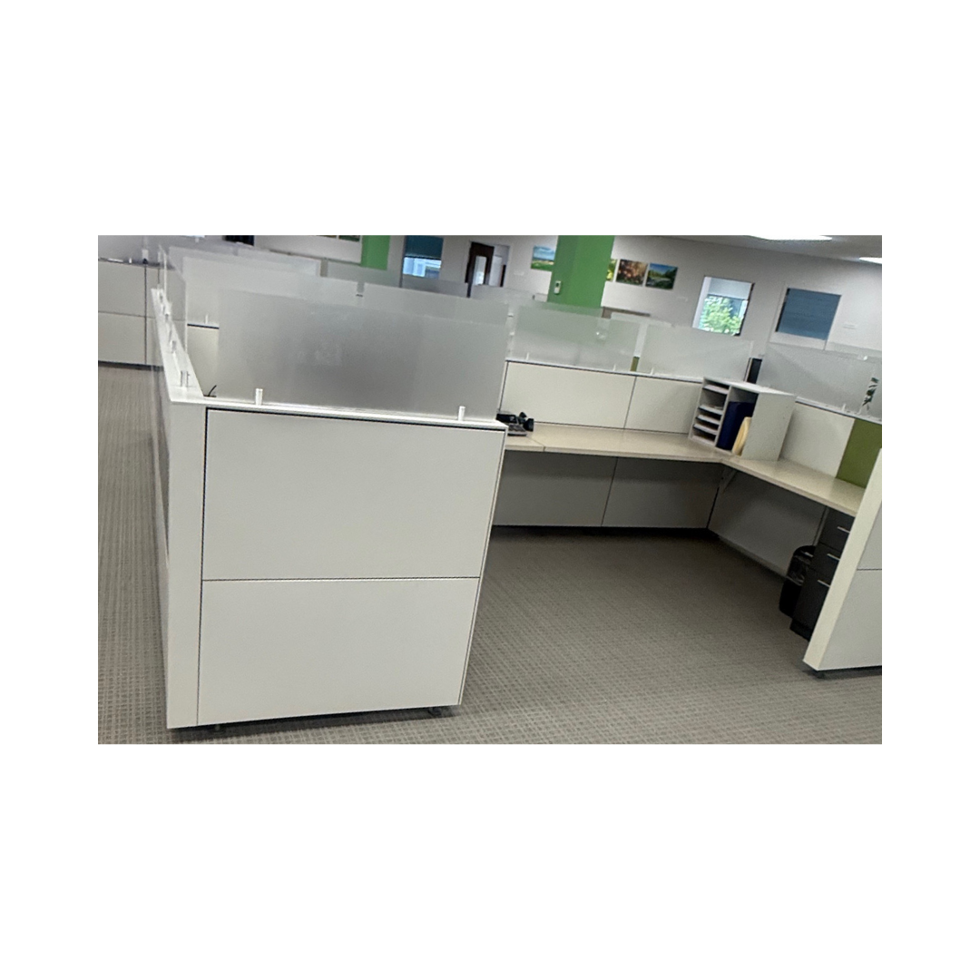 Commercial office workstation cluster with shared panel system in Raleigh,NC