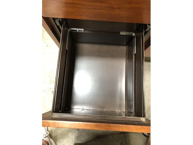 Interior view of vintage Steelcase credenza with sliding drawers and storage compartments