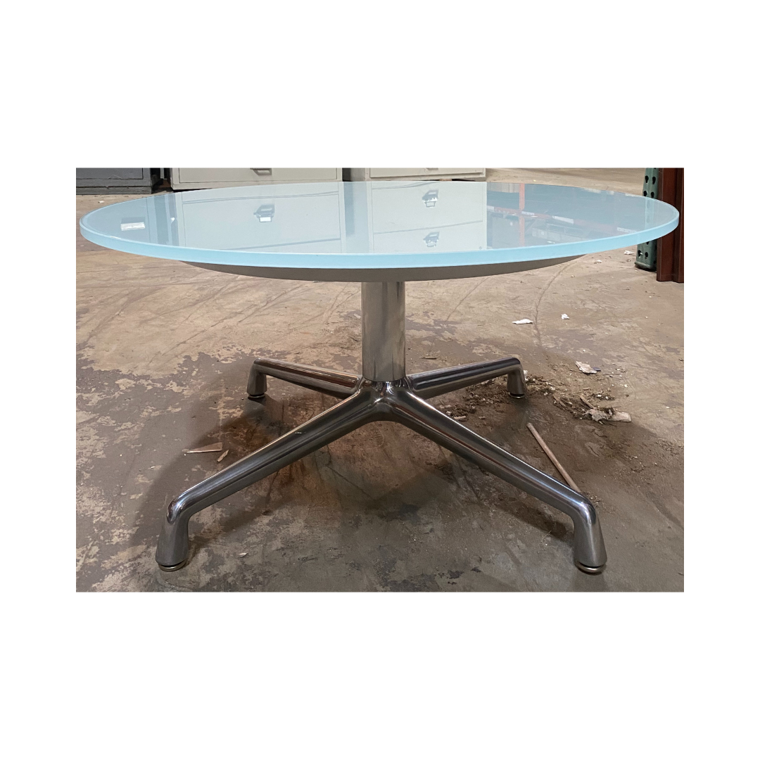 Modern round Coalesse SW_1 low table featuring a frosted glass surface