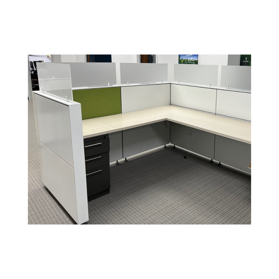 Open-Plan office cubicle featuring L-shaped worksurfaces