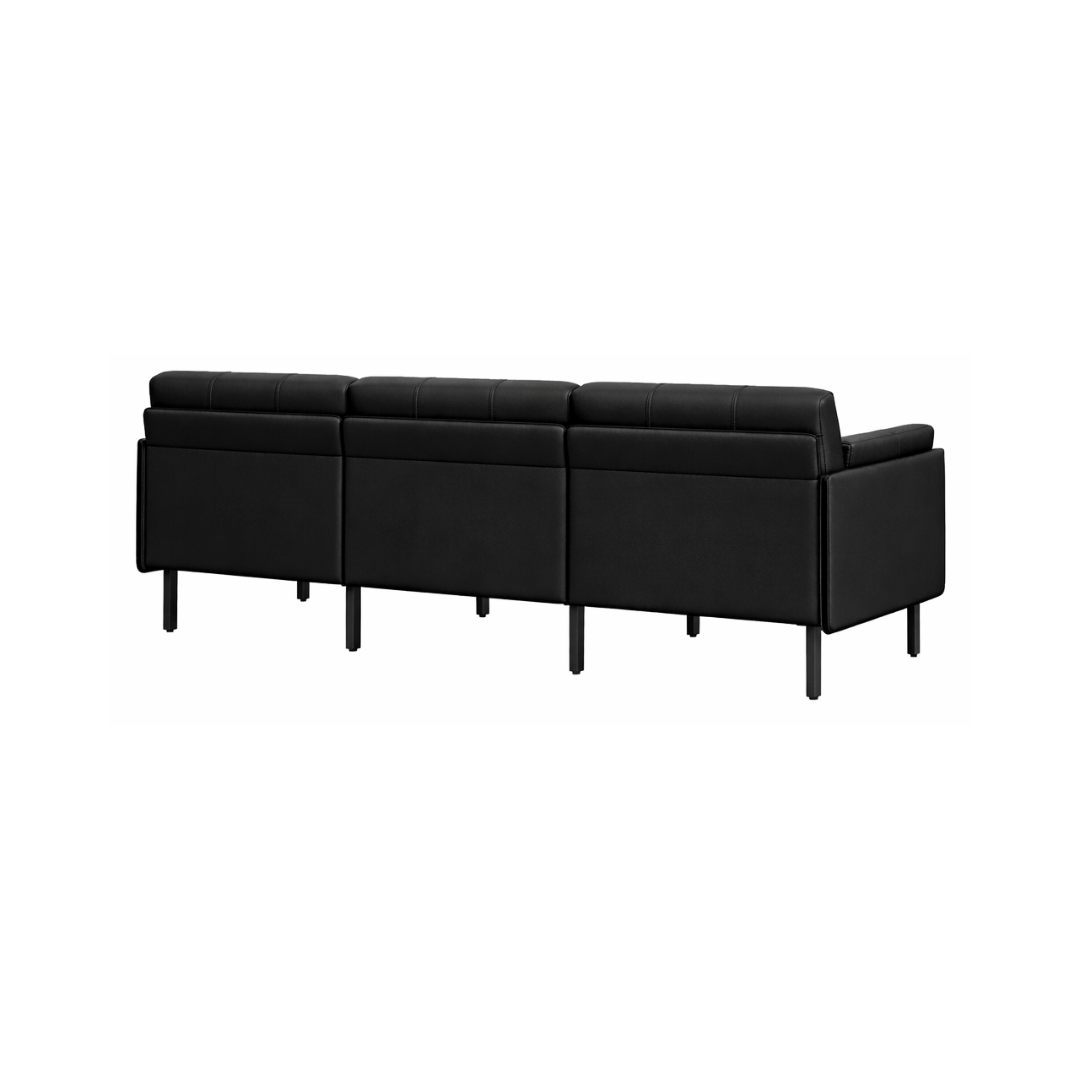 Modern three seat black sofa with tufted back cushions and durable commercial construction