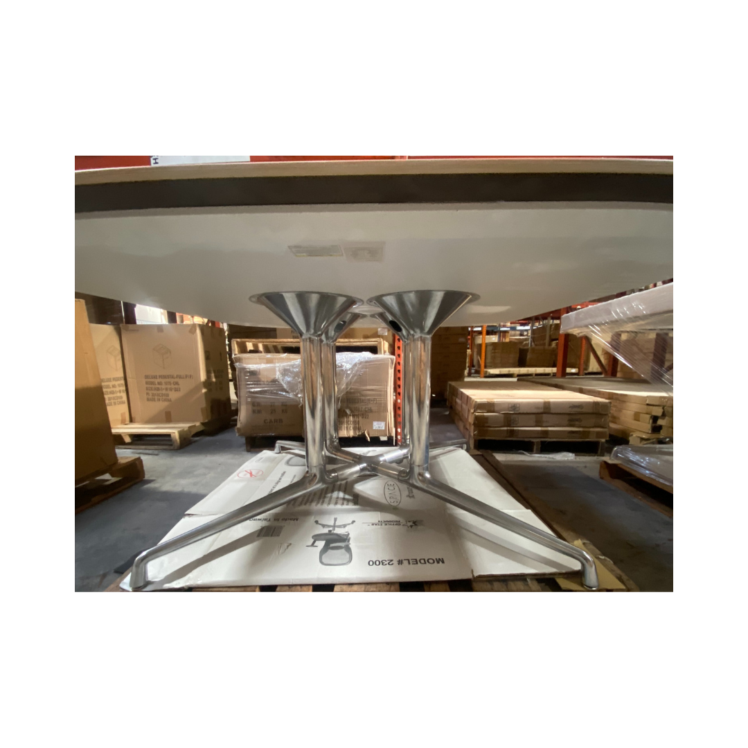 Modern rectangular meeting table featuring a light oak top, two cable grommets, and a sturdy Coalesse metal base