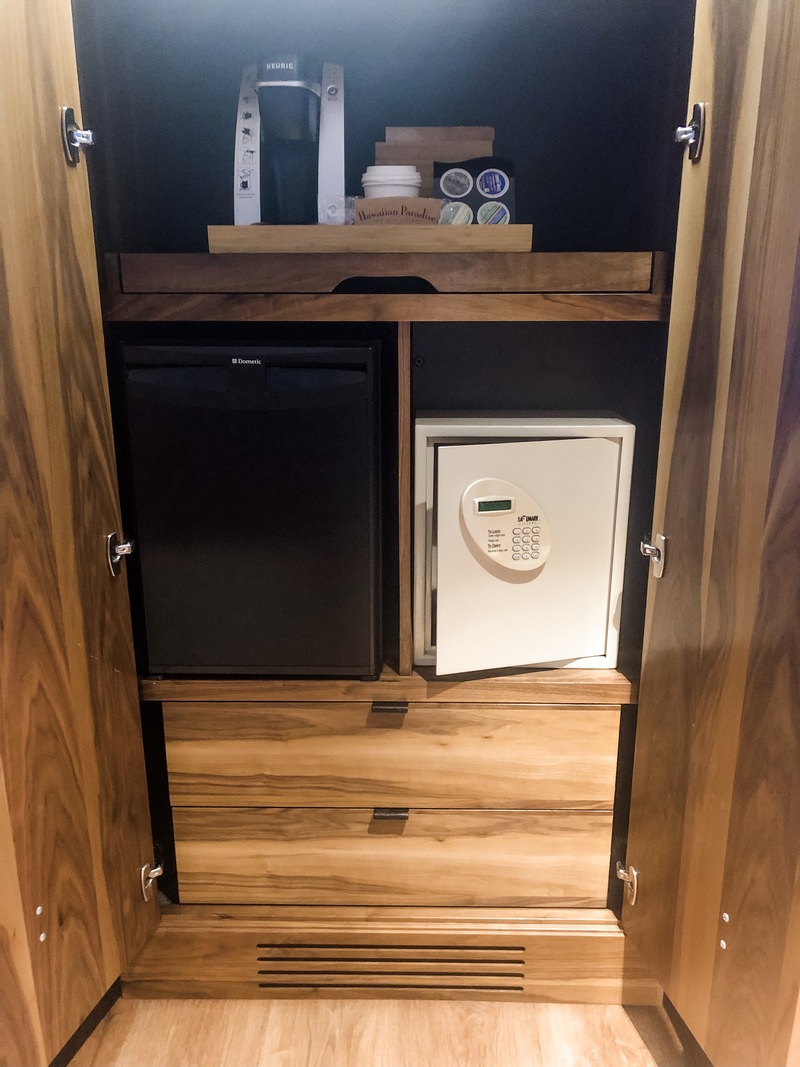 Coffee maker, safe, empty fridge, and drawers for longer stays