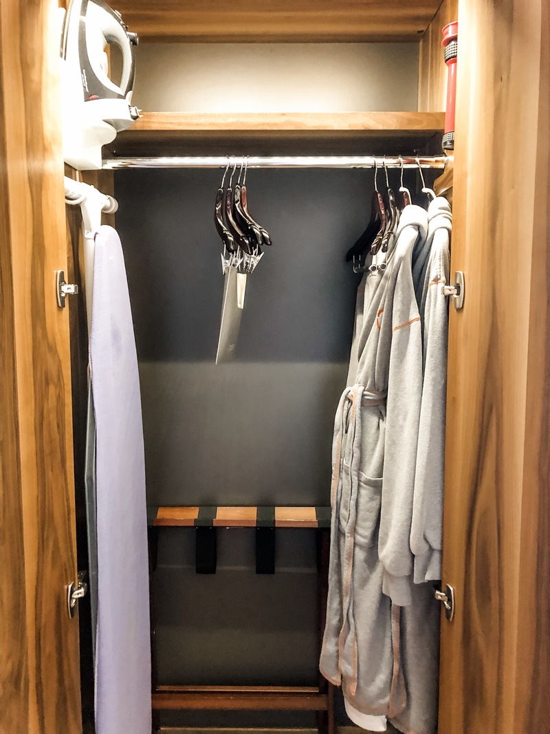 Iron, ironing board, robes, suitcase valet