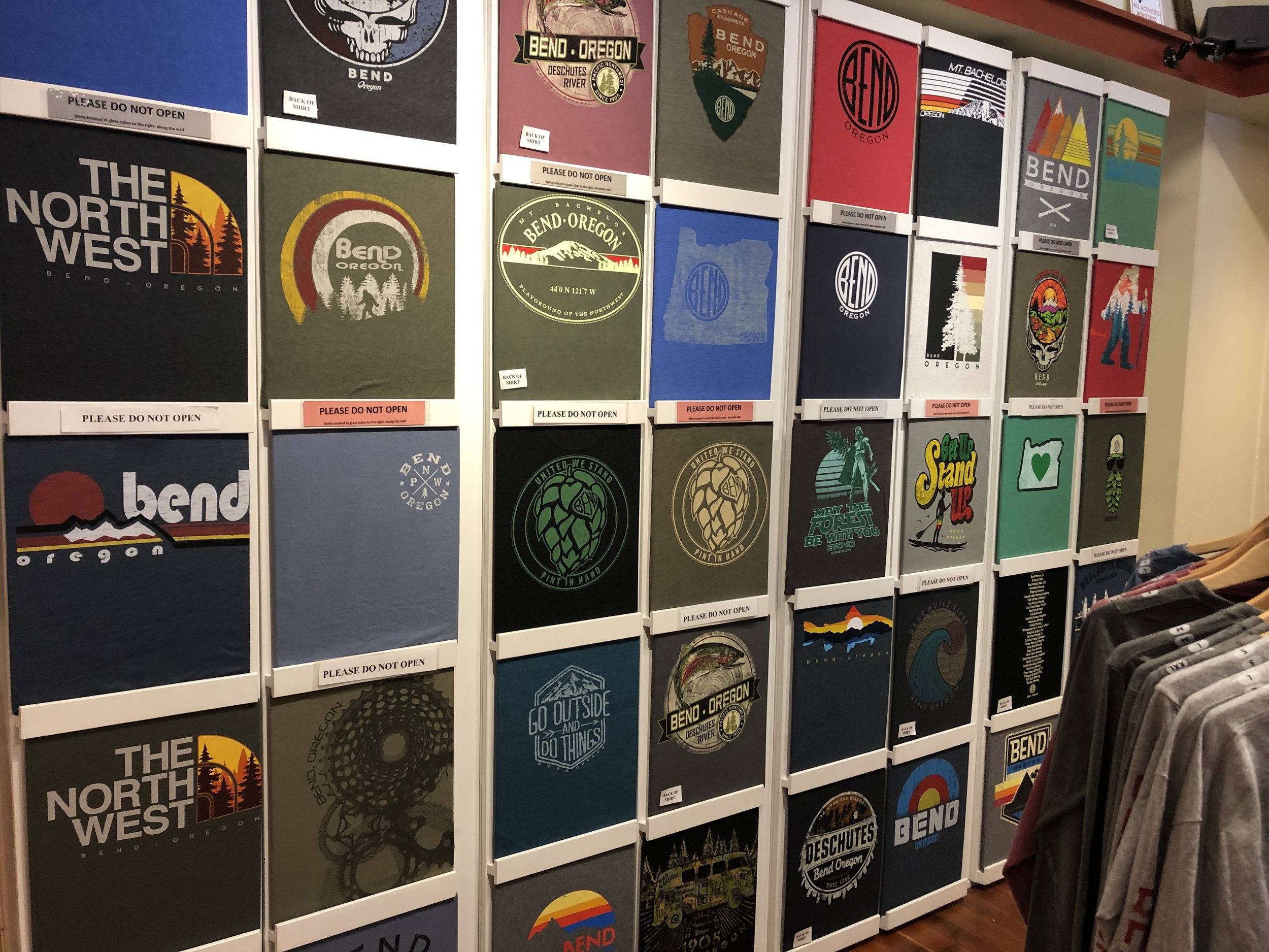 Cascade Cottons t-shirt wall