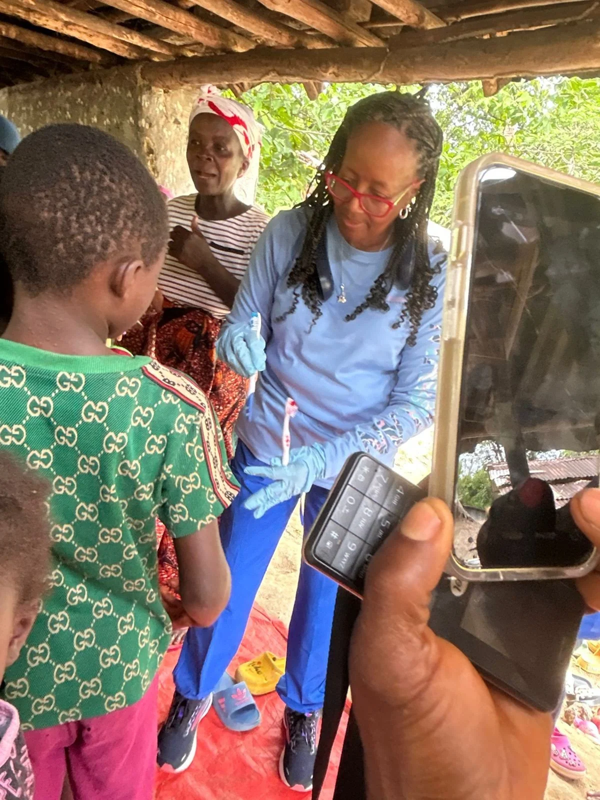 Issuing toothbrushes.jpg