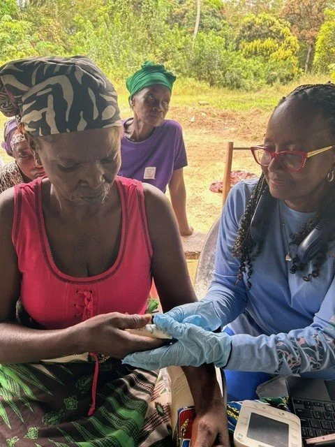 Ladies receiving supplies.jpg