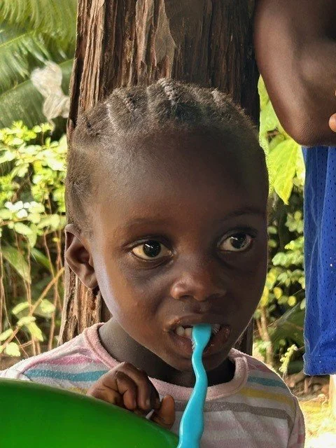 Toddler with toothbrush.jpg