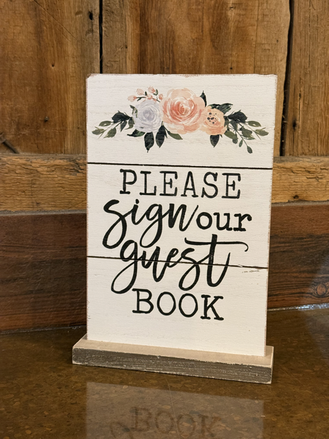 "Please sign our guestbook" Sign