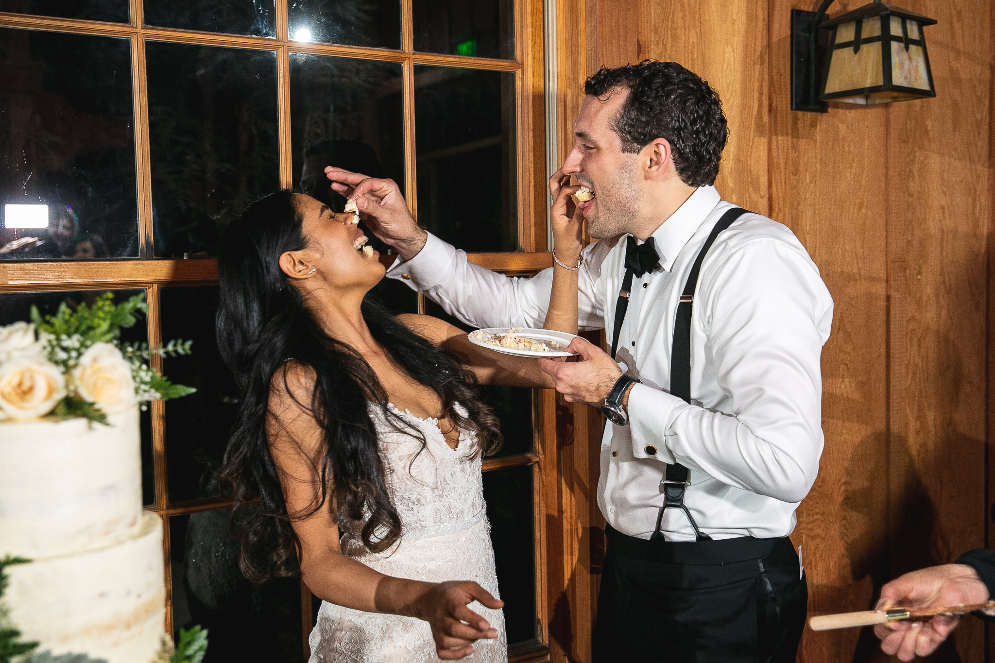Stephen had a hard time aiming for Sarah’s mouth while feeding her cake.