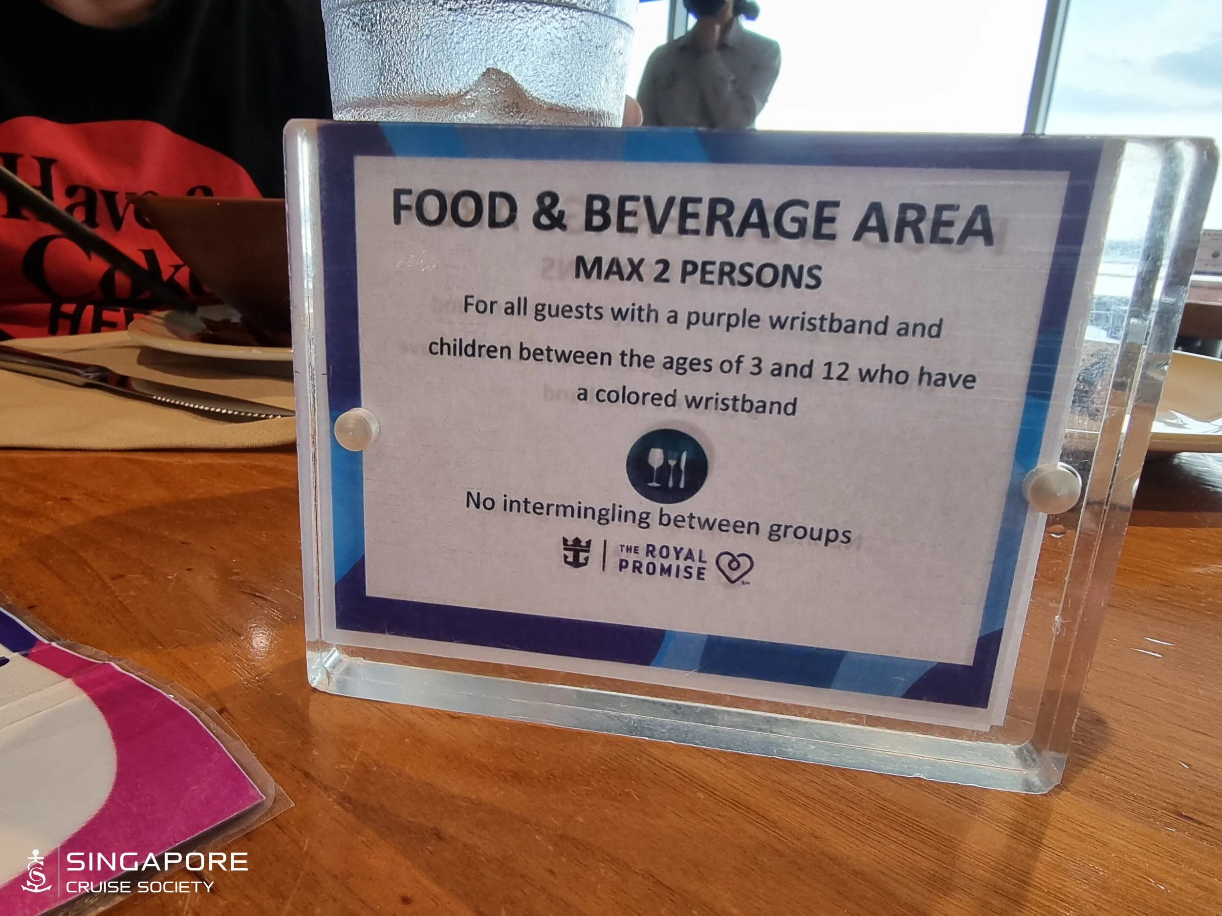Signs like these are placed throughout the ship's F&B areas to remind guests of the new rules.