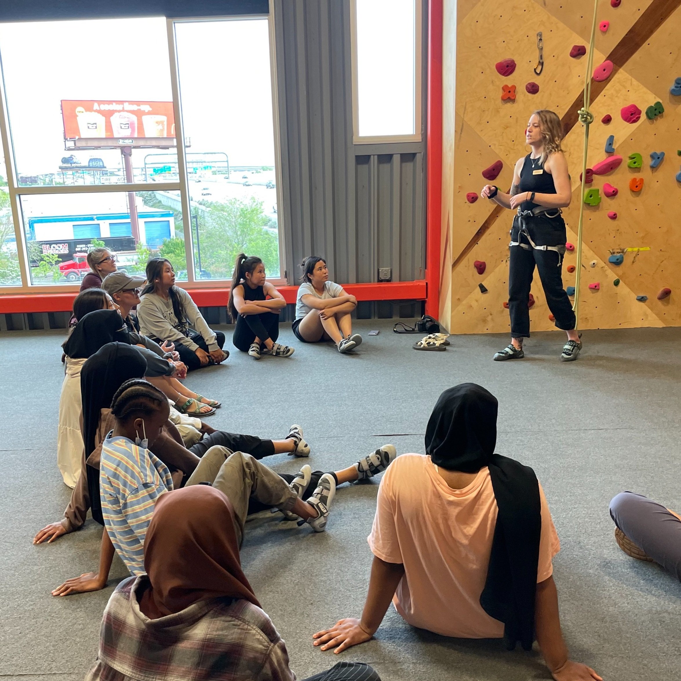 Janelle+teaching+climbing+2022.jpg