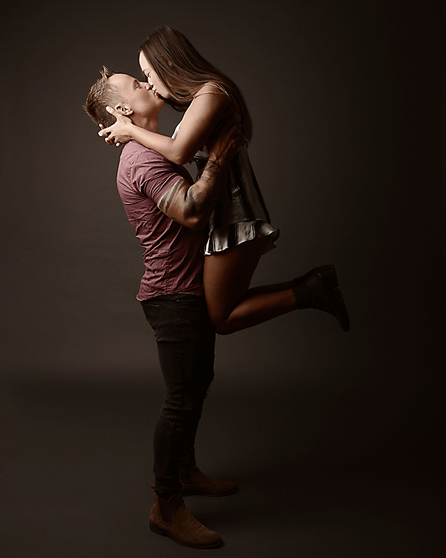 Flexible young modern dance couple posing in studio. Stock Photo by  master1305