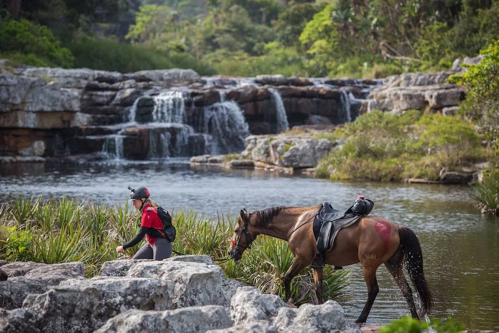 Sarah-and-Gerber-crossing-a-waterfall-during-Race-the-Wild-Coast-PC-Rockethorse-Racing.jpg