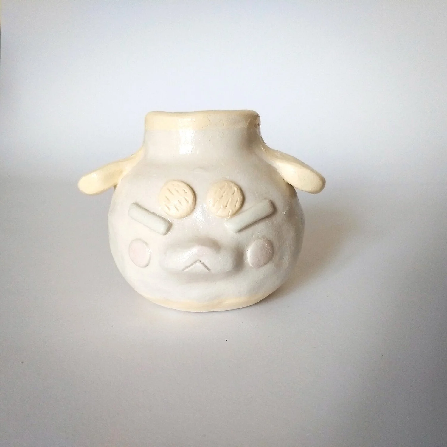 Plump Dog the Vase: A very proud Underdog.