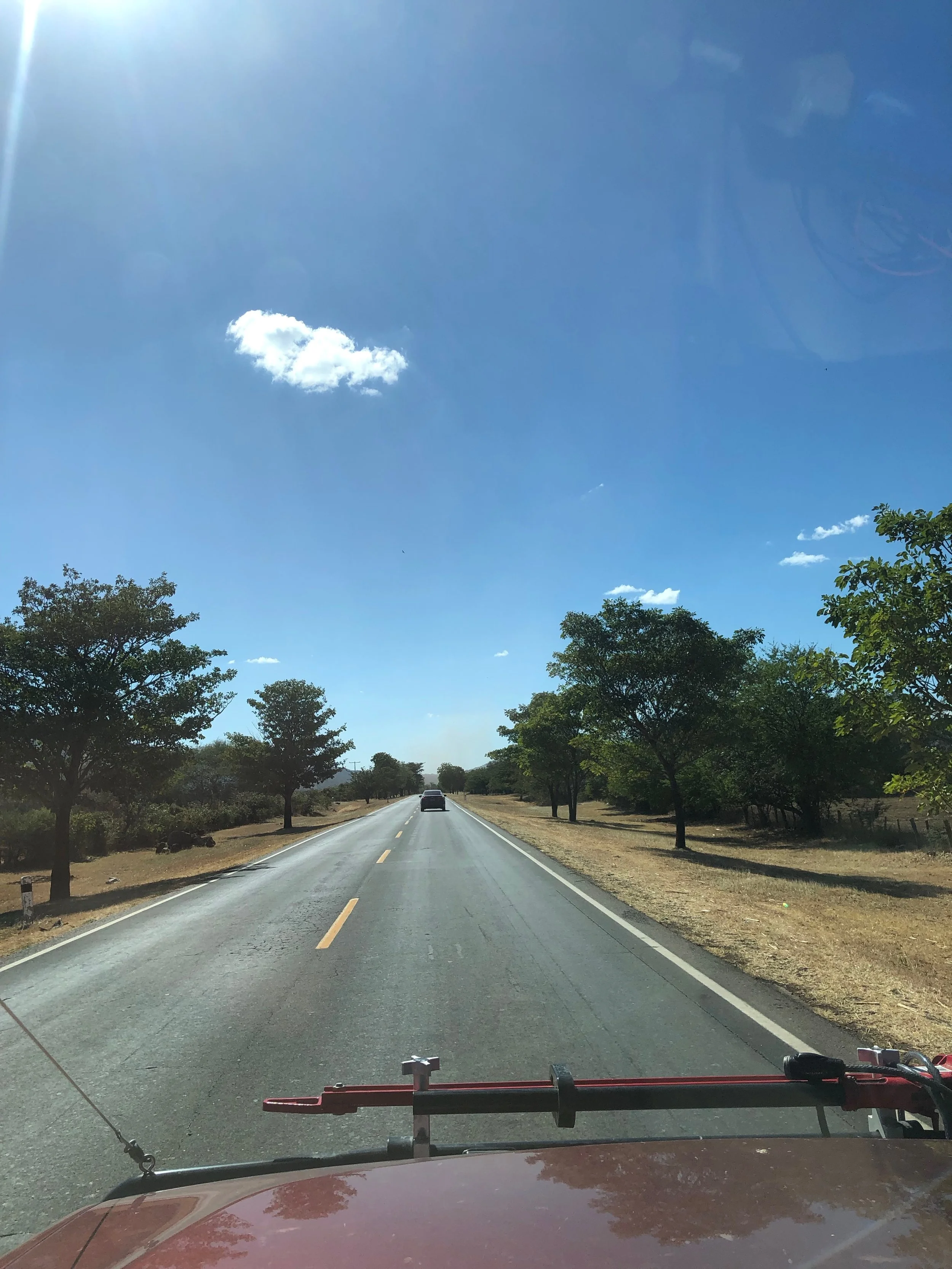 Nicaraguan road to Leon. This was taken moments after entering the country and moments before my first run in with the Nicaraguan police