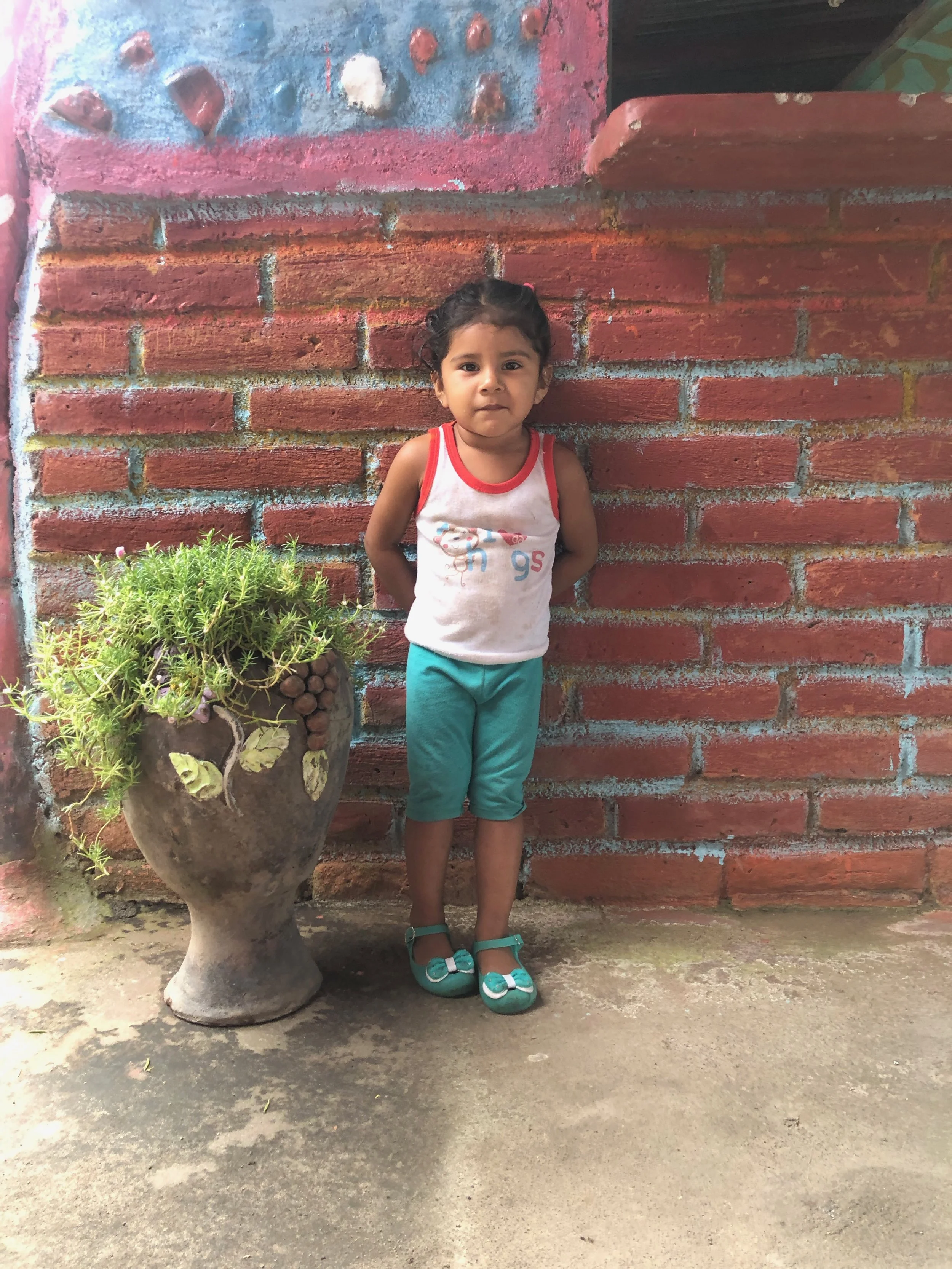 The daughter of the restaurant owner who let us use his beachfront