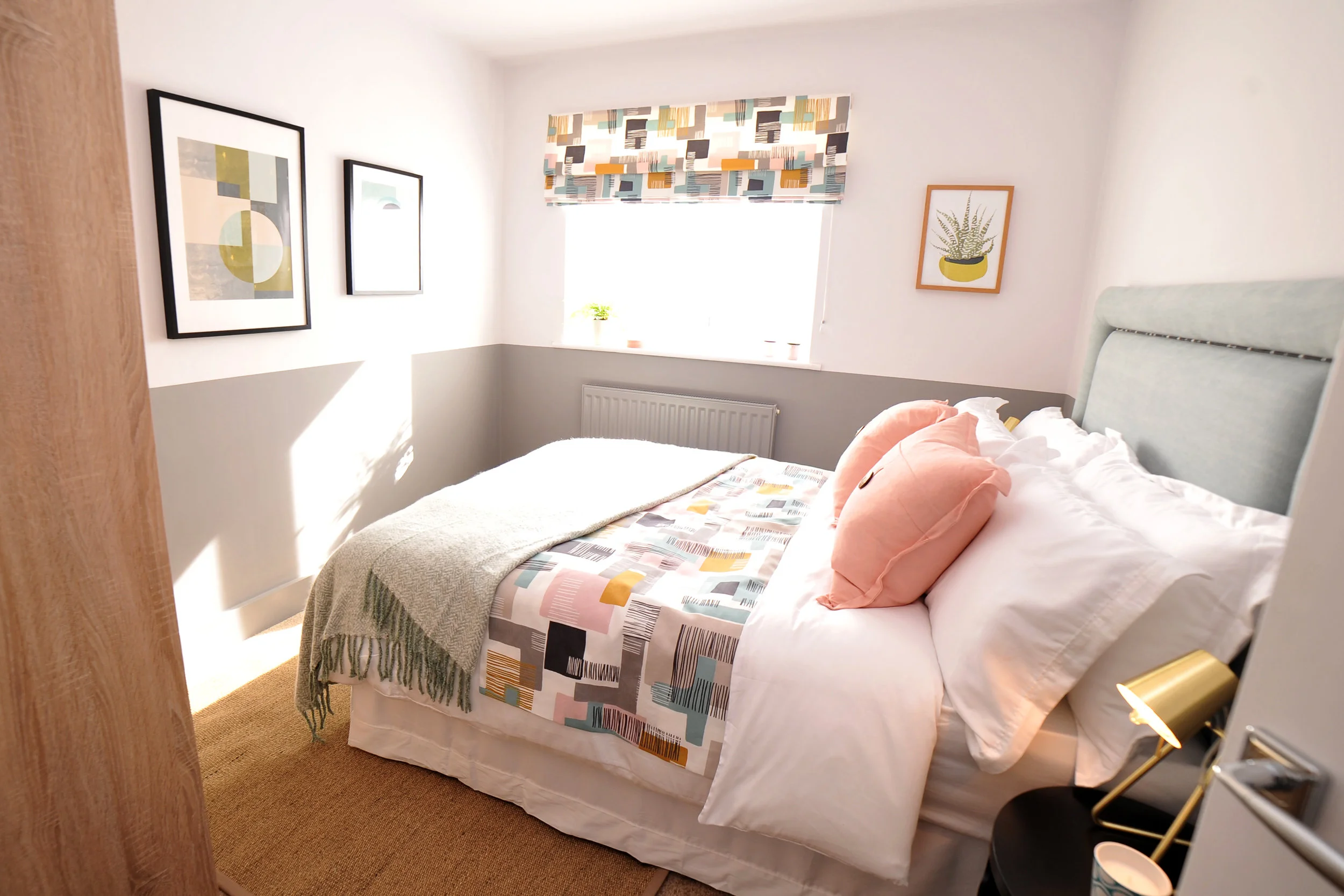 Bedroom with grey half height painted walls