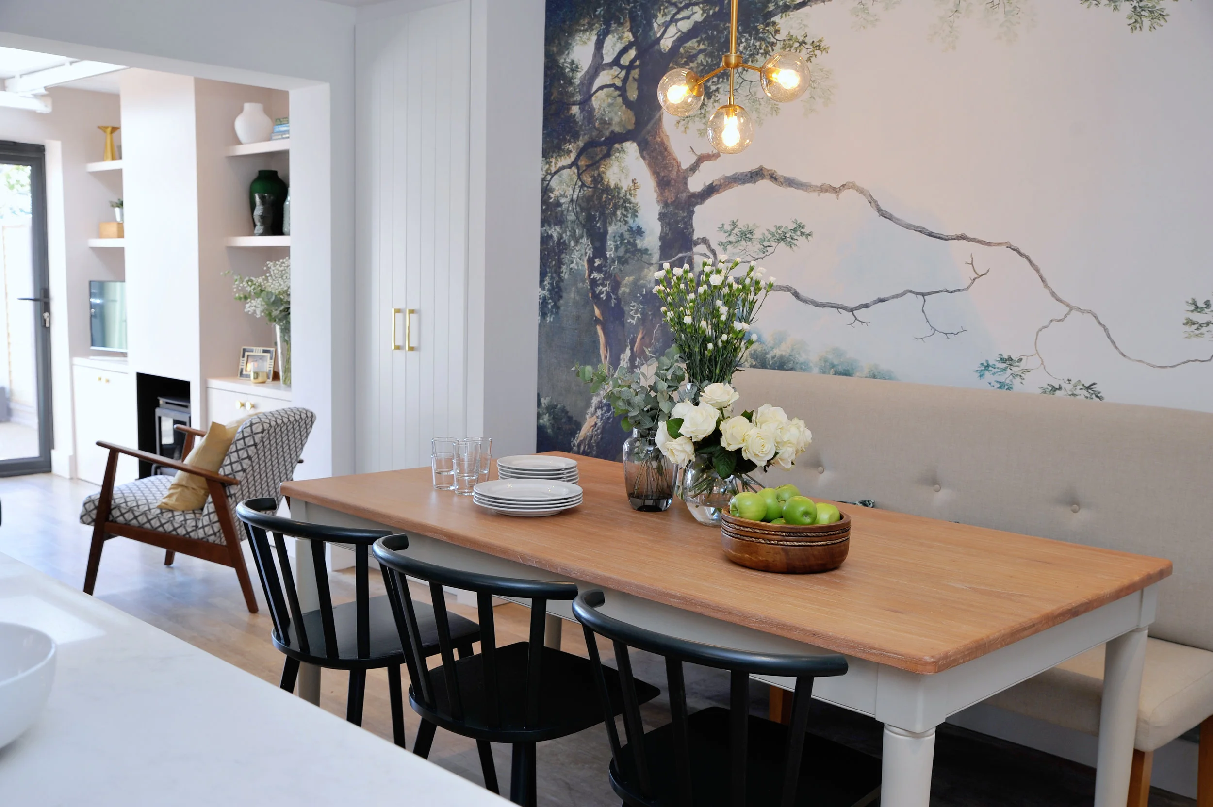 Dining room with feature wall and upholstered bench