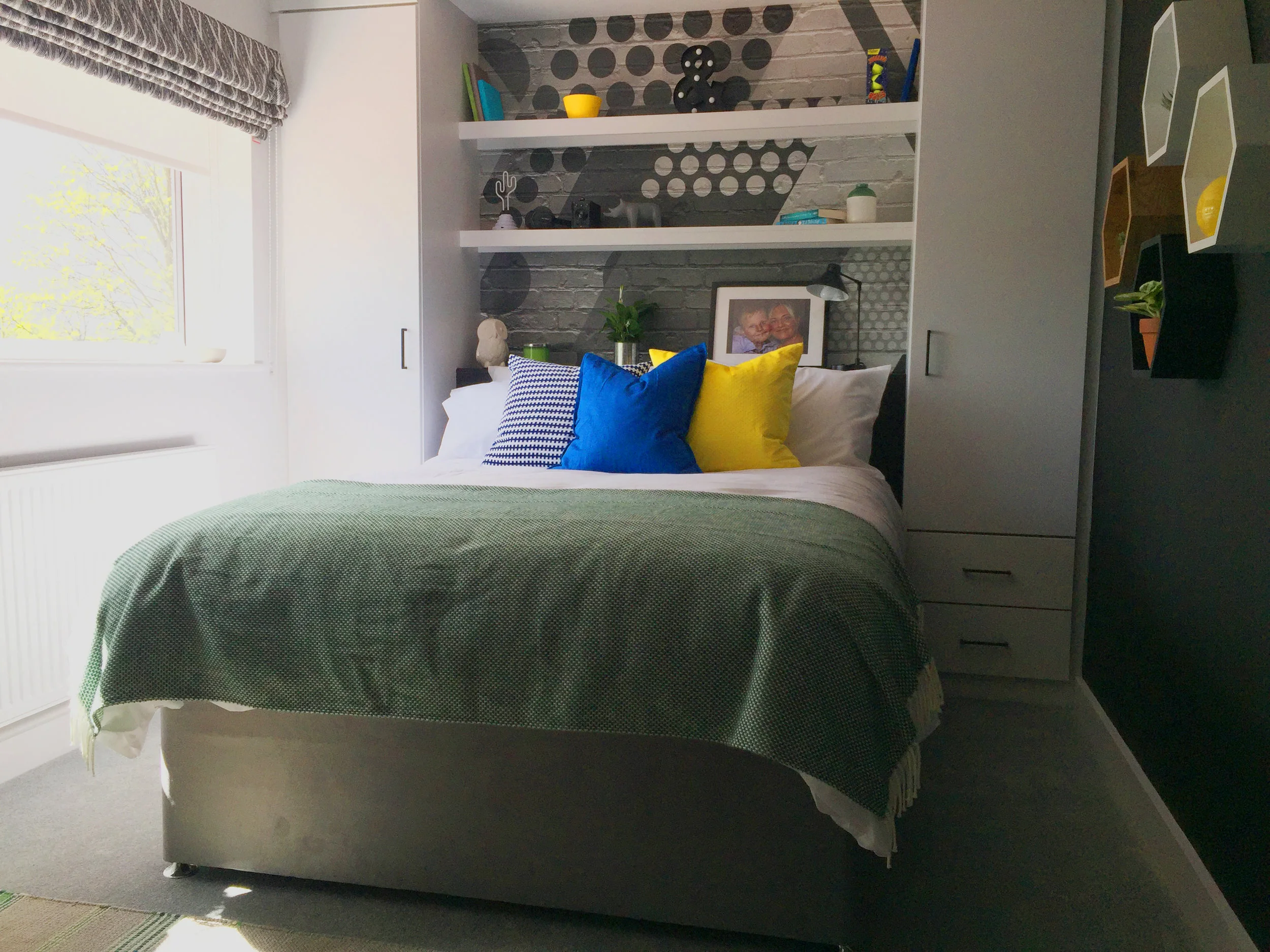 Teenage monochrome bedroom with pops of colour
