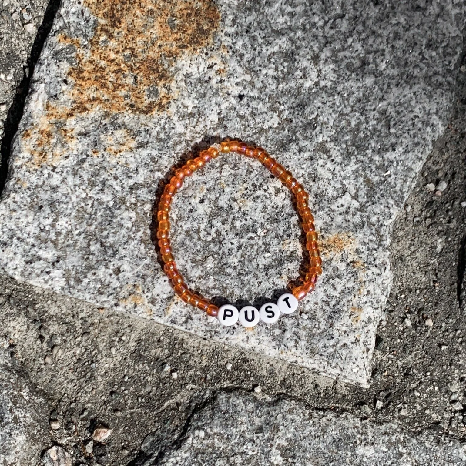 "Pust" armbånd