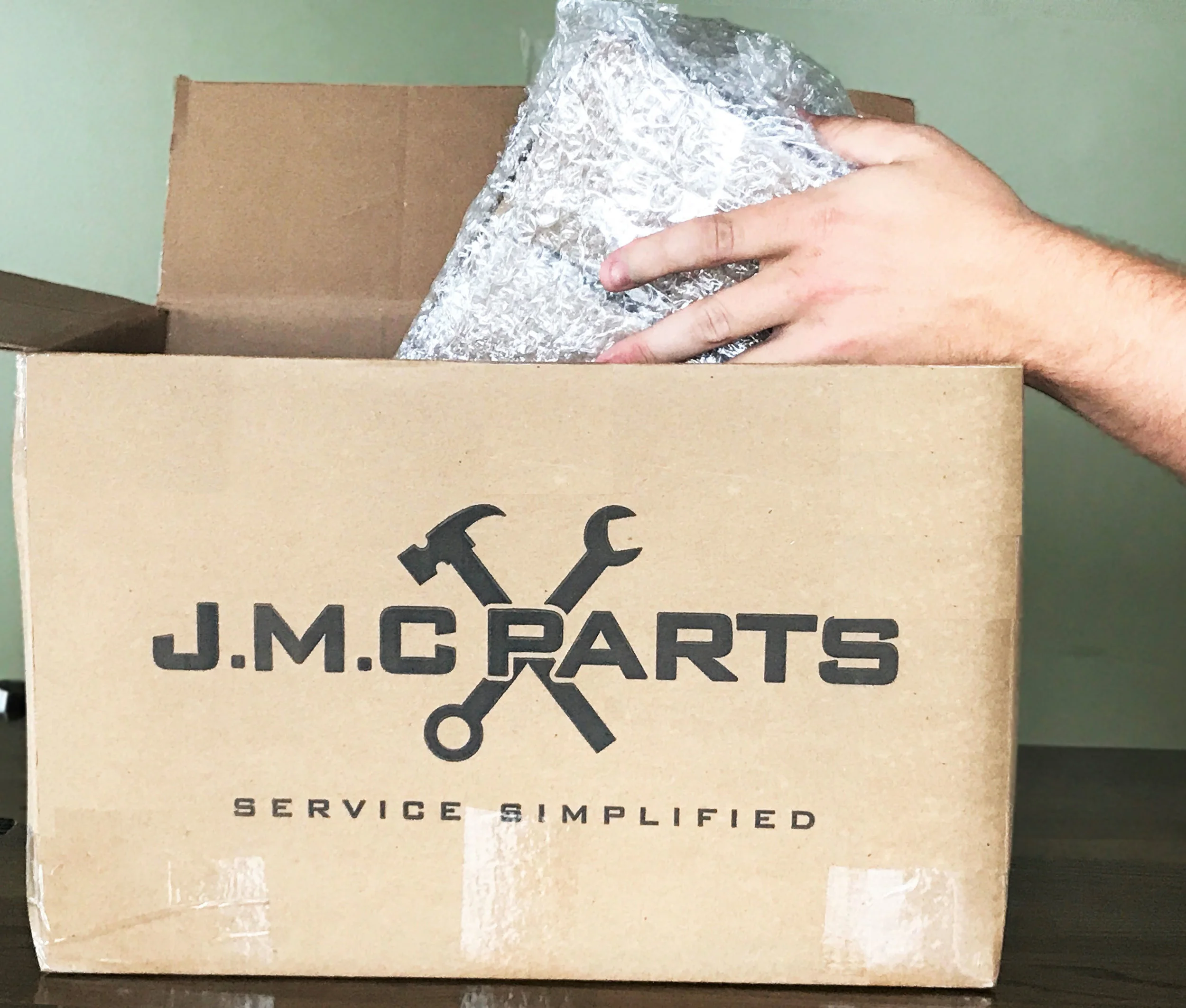 Parts Box With Hands.jpg