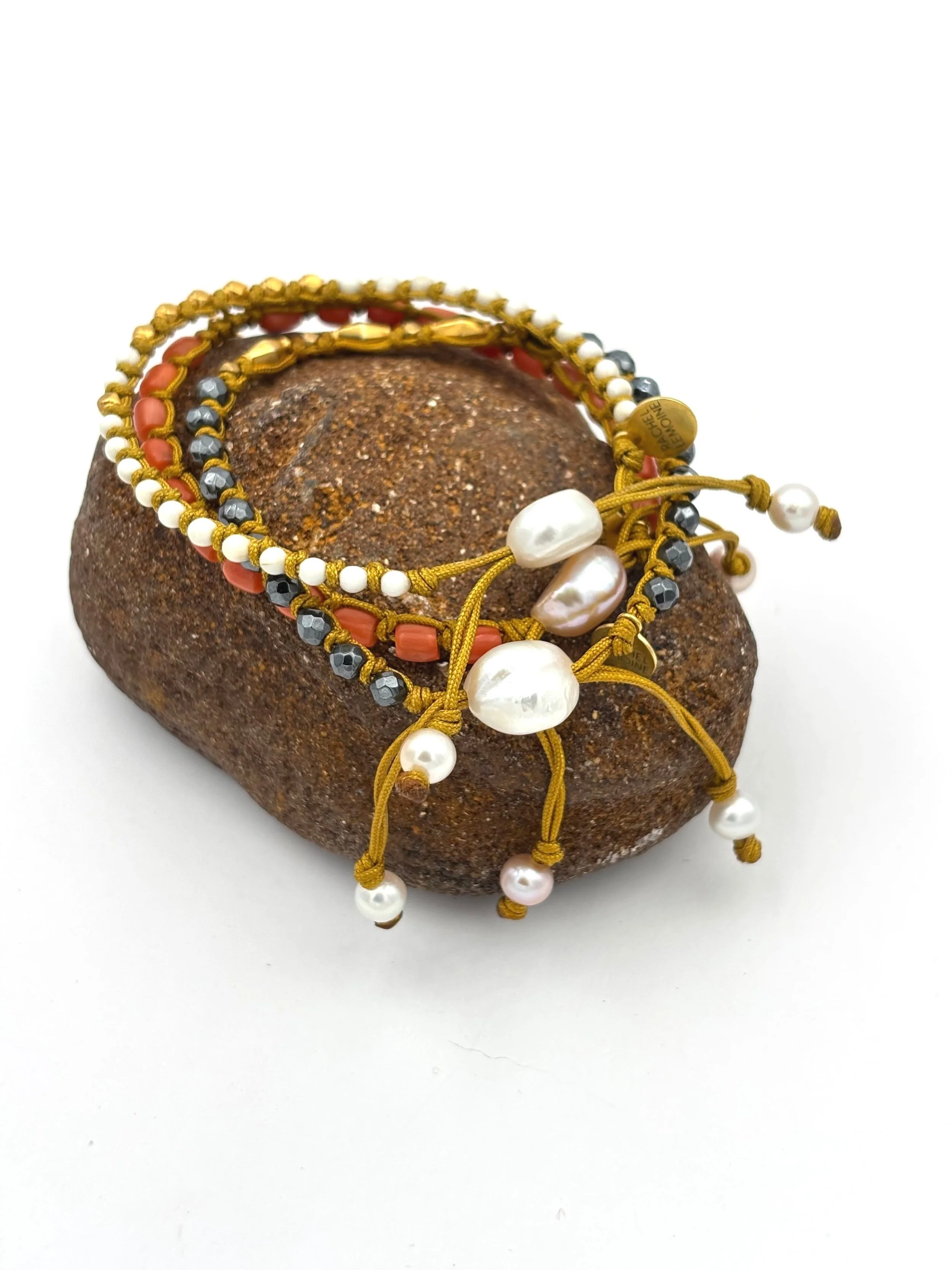 back of hematite coral and ivory.jpg