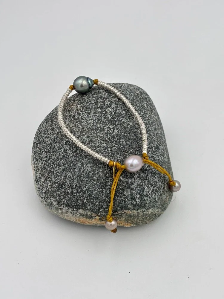 silver and grey boroque pearl on rock alt.jpg