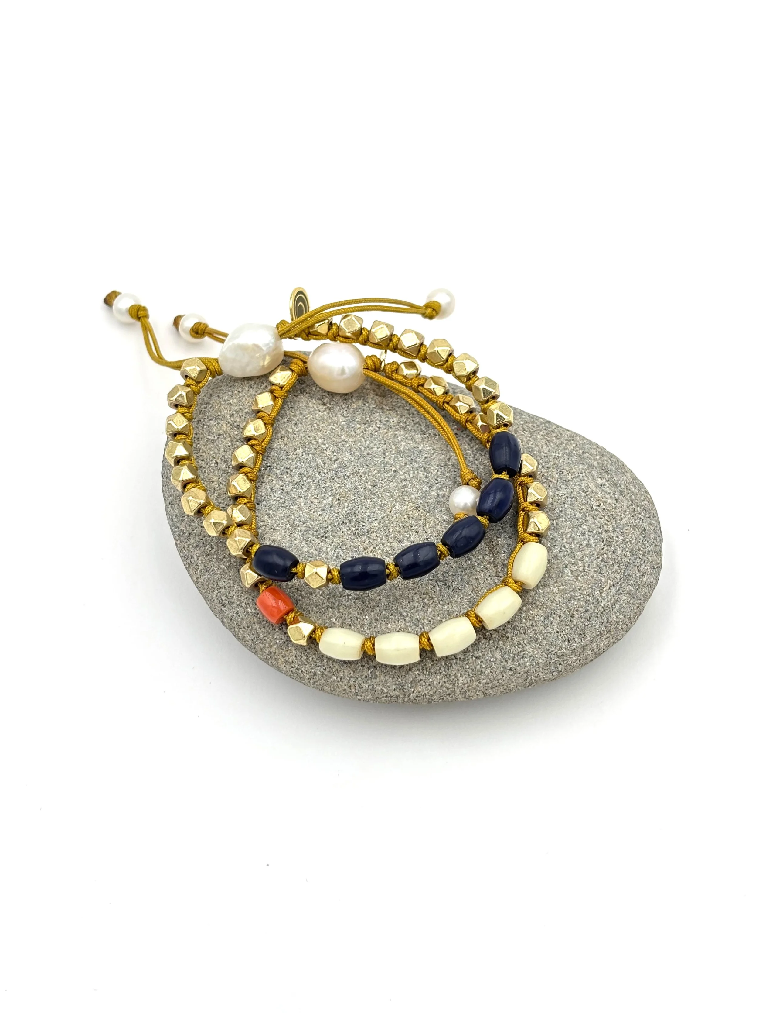 ivory and lapis on rock.jpg