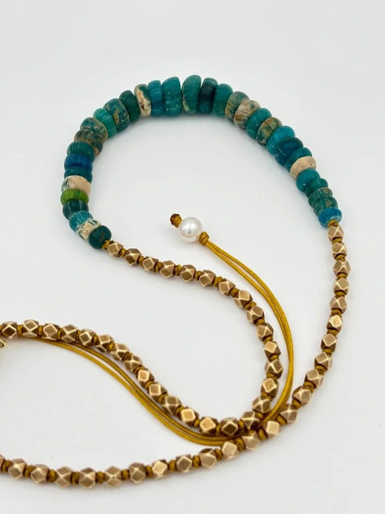 roman glass necklace tiwsted upclose.jpg