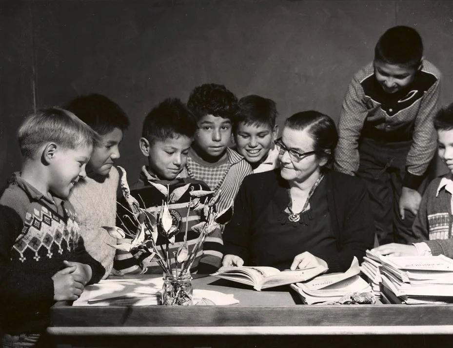 “Boys of grade 3 and 4 get help from teacher Miss Irene Reesor,” undated photo by Nick Nickels, Curve Lake Reserve (Ontario)