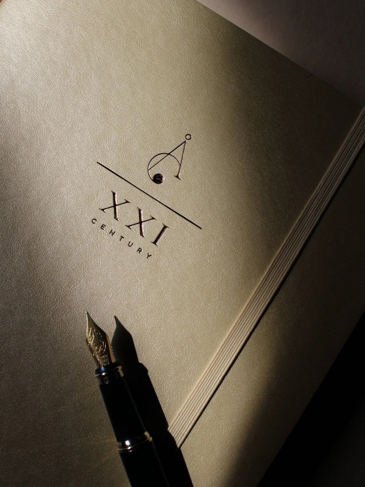 XXI.
A reference to the present age.
For those shaping what&rsquo;s next&mdash;free from the limits of time.
&nbsp;
In numerology, XXI carries the combined energies of 1 and 2, signifying a powerful combination of new beginnings, independence, and se