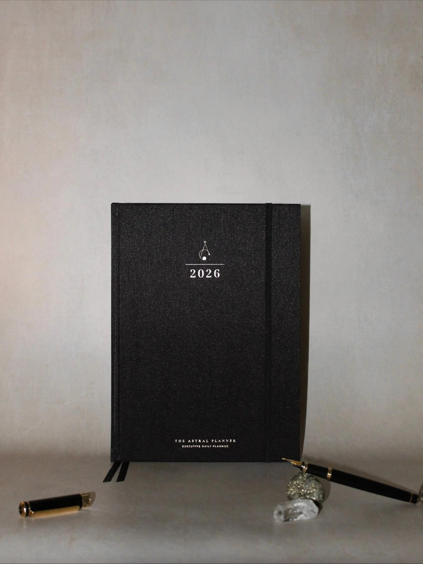 Every detail of our 2026 Executive Daily Planner was designed to make your daily planning practice feel beautiful and worth returning to.⁠
⁠
Bound in a quietly indulgent black silk fabric, its rich grain, subtle sheen, and weight in the hand evoke th