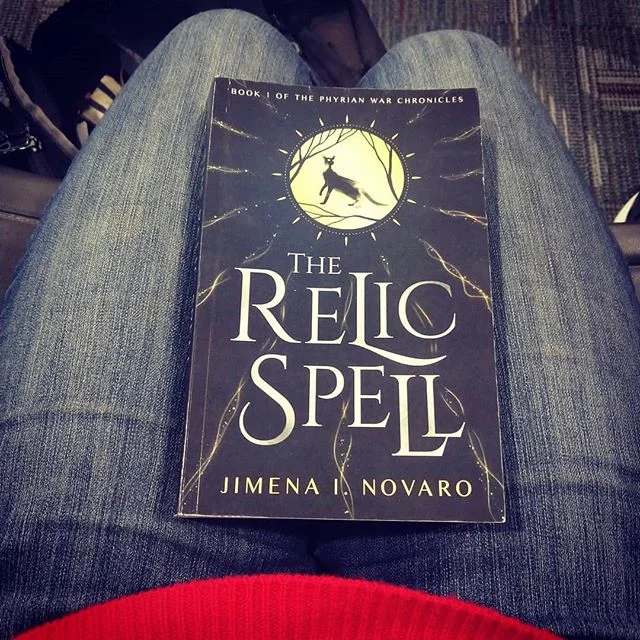 The Relic Spell is traveling across three continents with me today as I head home for the holidays! Check out my Instagram feed, where I’m posting pictures from my different stops.