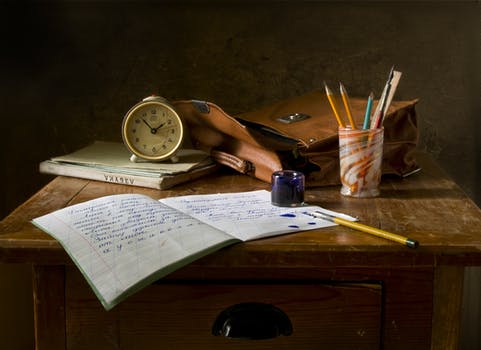 x open journal on desk.jpeg