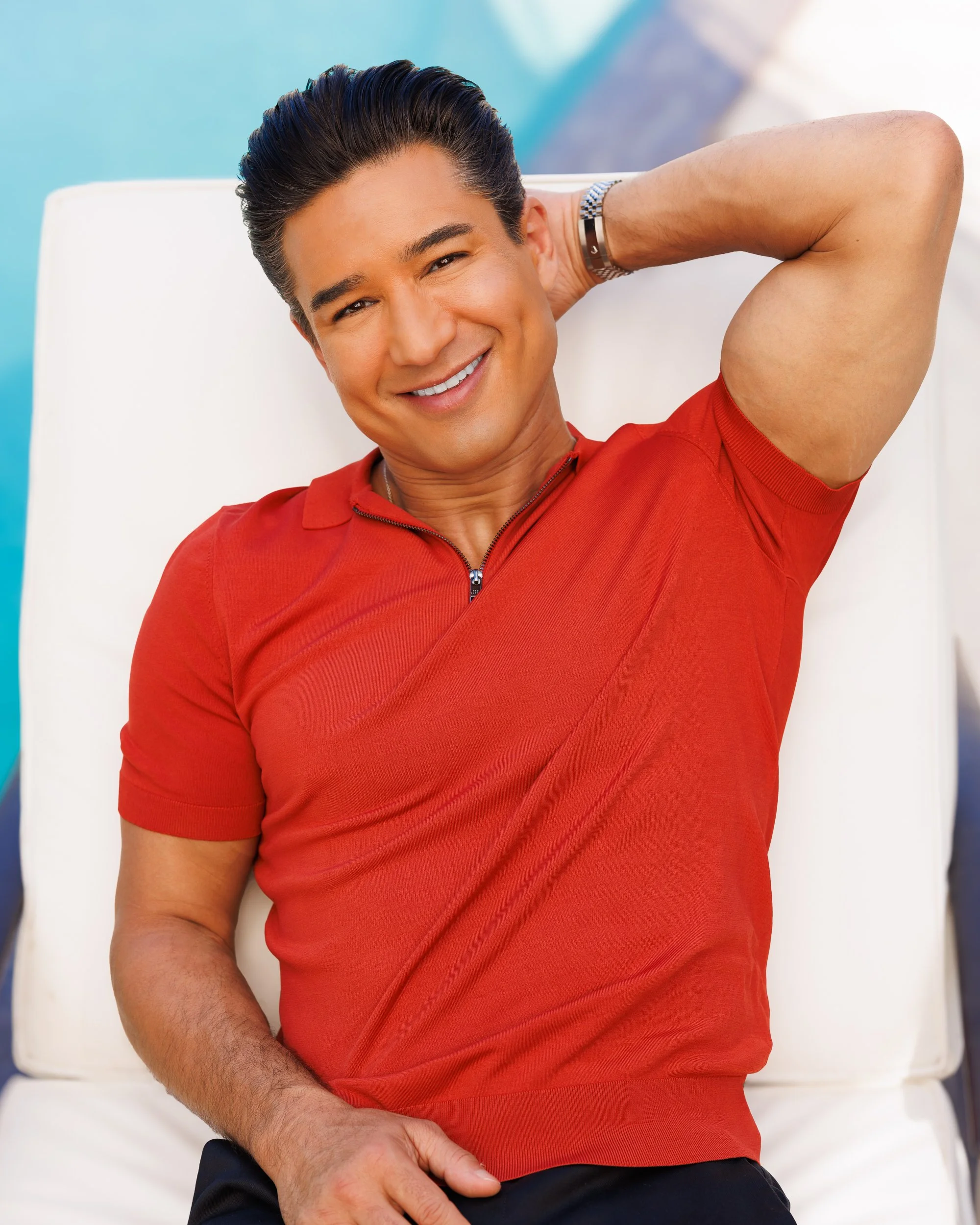 Mario Lopez photographed for Us Weekly cover story wearing red polo shirt