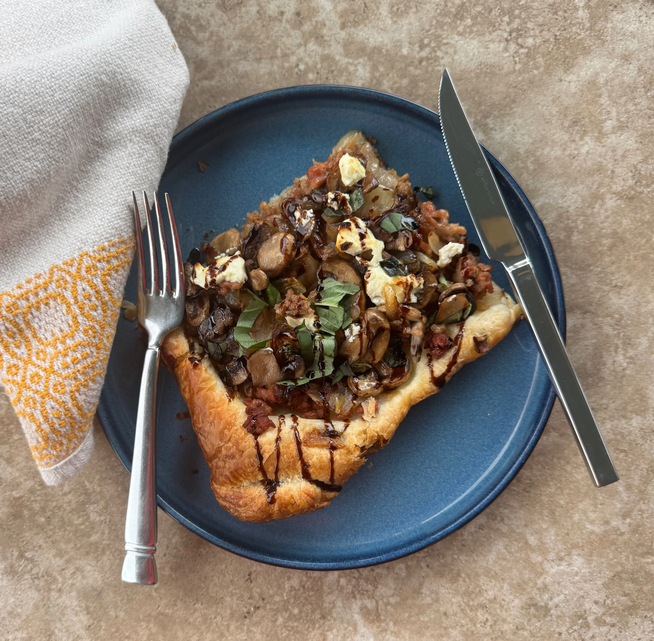 Puff Pastry Pizza with Italian Sausage, Caramelized Onions, Mushrooms, and Goat Cheese 